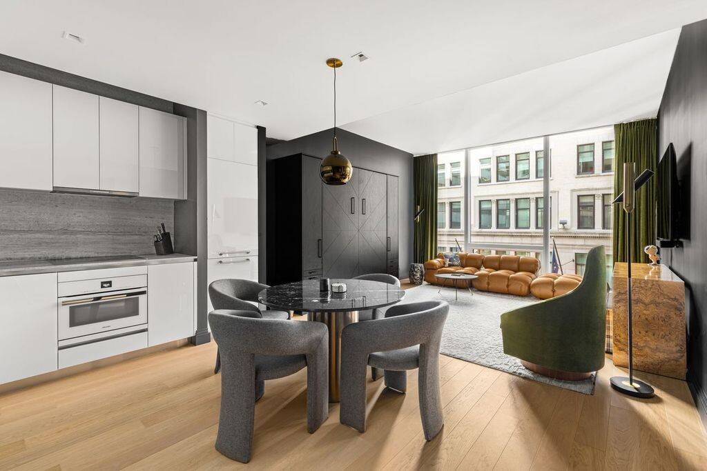 Enjoy Loft Like Living in Unit 710 and the Luxury Lifestyle that is One Wall Street !