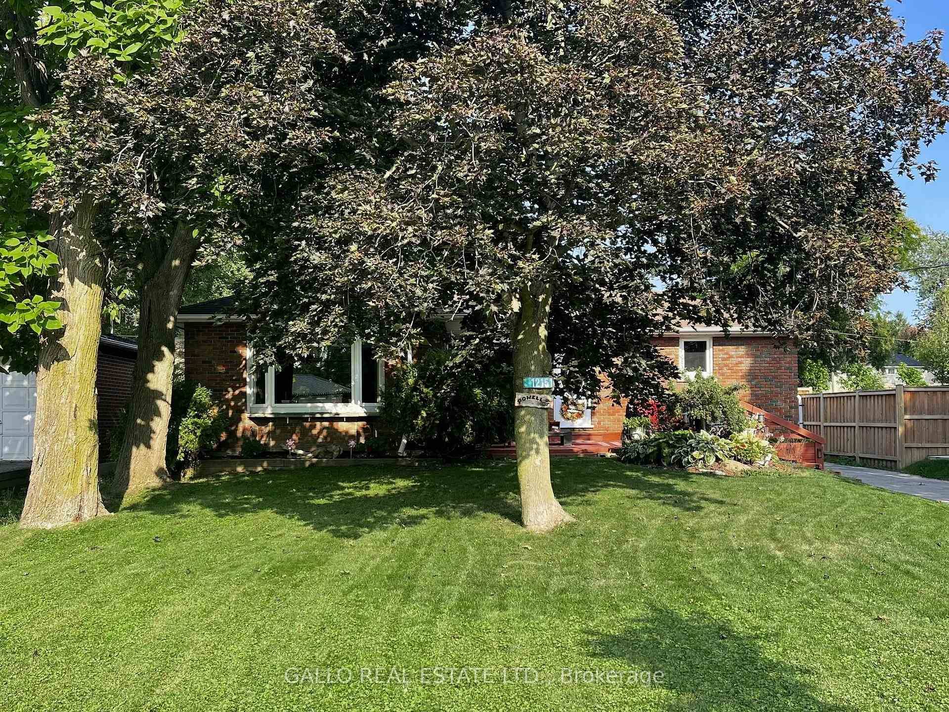 Welcome to this Open Concept 3 bedroom Brick Bungalow with detached Garage Private yard with mature trees Great for entertaining family and friends !