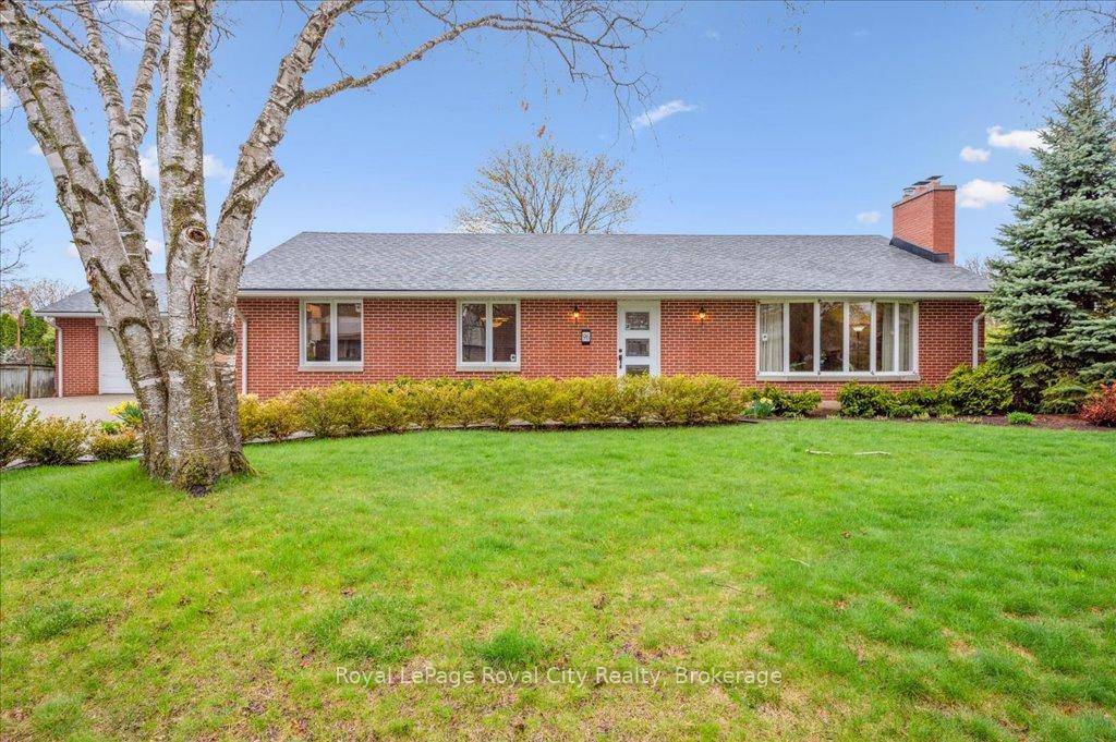 This charming brick bungalow sits on a generous lot in Guelph's sought after General Hospital neighbourhood and offers endless possibilities.