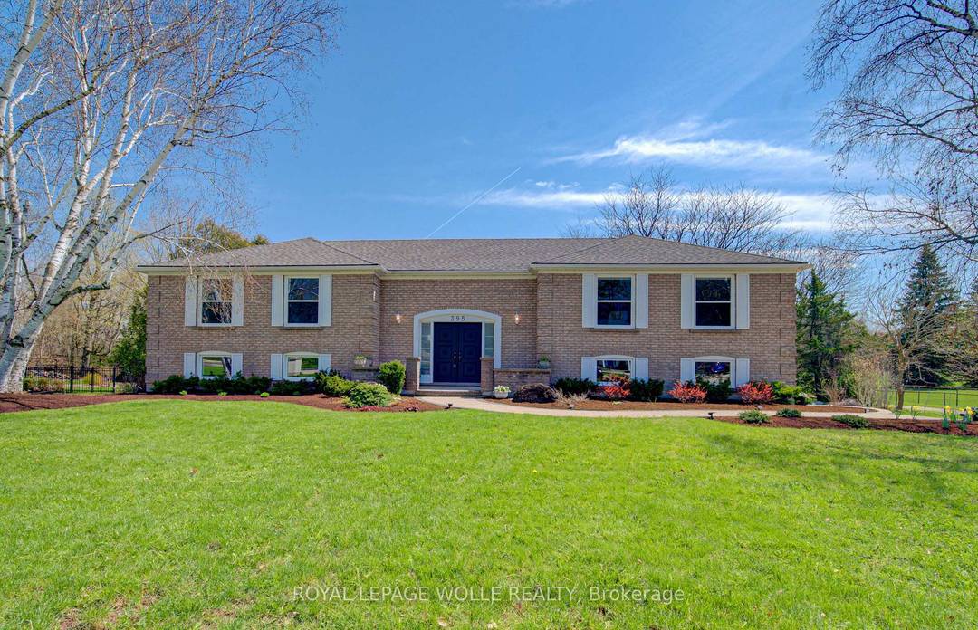 Welcome to 395 Warrington Drive in Waterloo a beautifully renovated raised bungalow set on an exceptional 1 2 acre lot, an incredibly rare offering in the heart of the city.