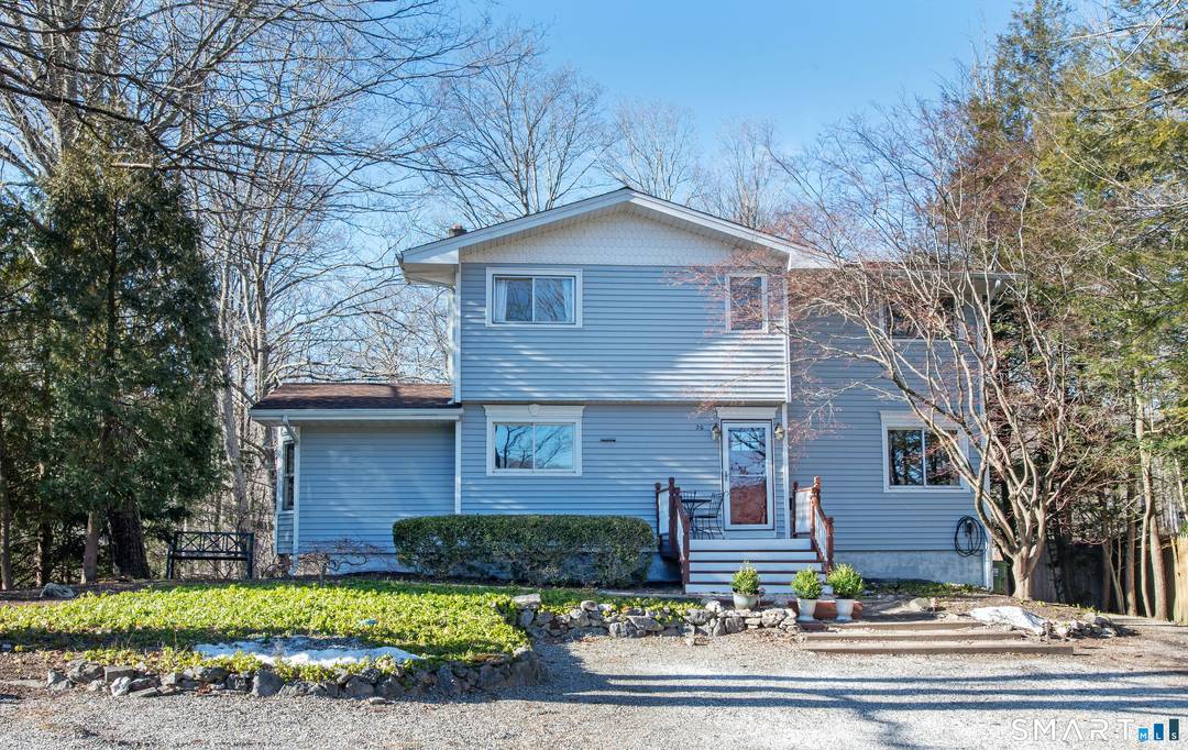 Welcome Home ! Set in Ridgefield's desirable Lakes district and on a special cul de sac street, this charming Colonial is light, bright, and full of character, reflecting pride of ...
