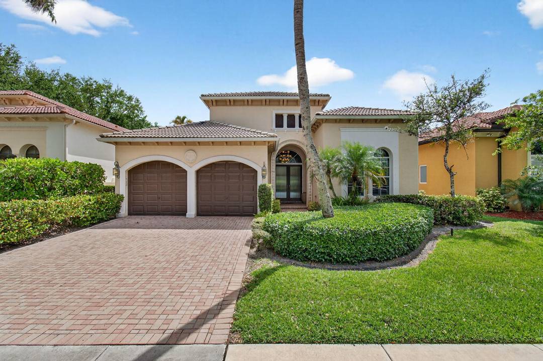 Beautiful one level home in the prestigious Oaks of Boca Raton community with dual water views serene lakefront setting in the back with gorgeous water views out front.
