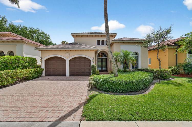 Beautiful one level home in the prestigious Oaks of Boca Raton community with dual water views serene lakefront setting in the back with gorgeous water views out front.