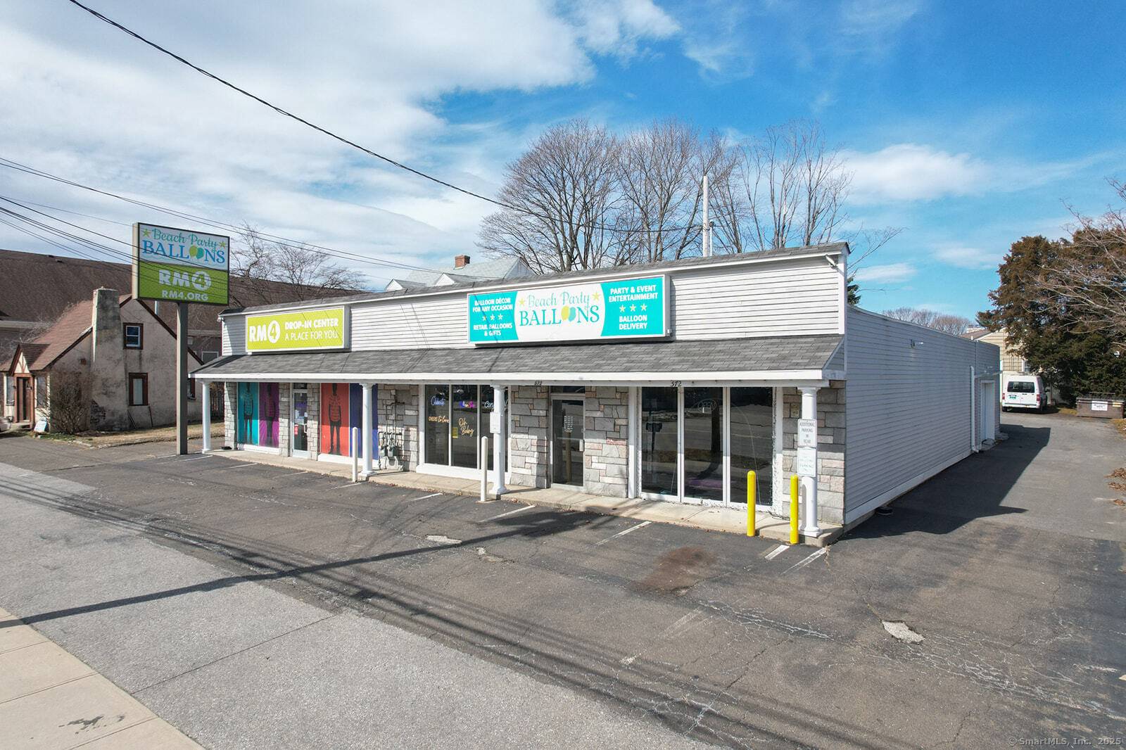 Welcome to 572 Boston Post Road, Milford, CT 06460, a prime commercial building that is versatile space for retail or office use.