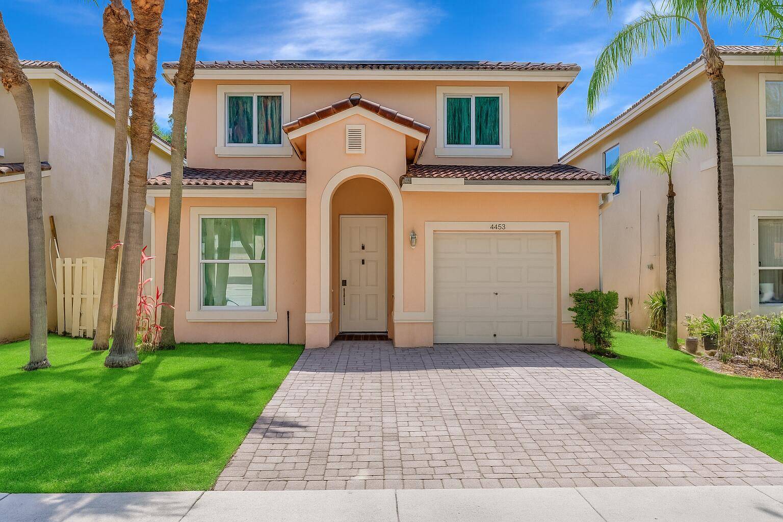 Welcome to this beautiful home located in the highly desirable Lakes of Laguna gated community in West Palm Beach.
