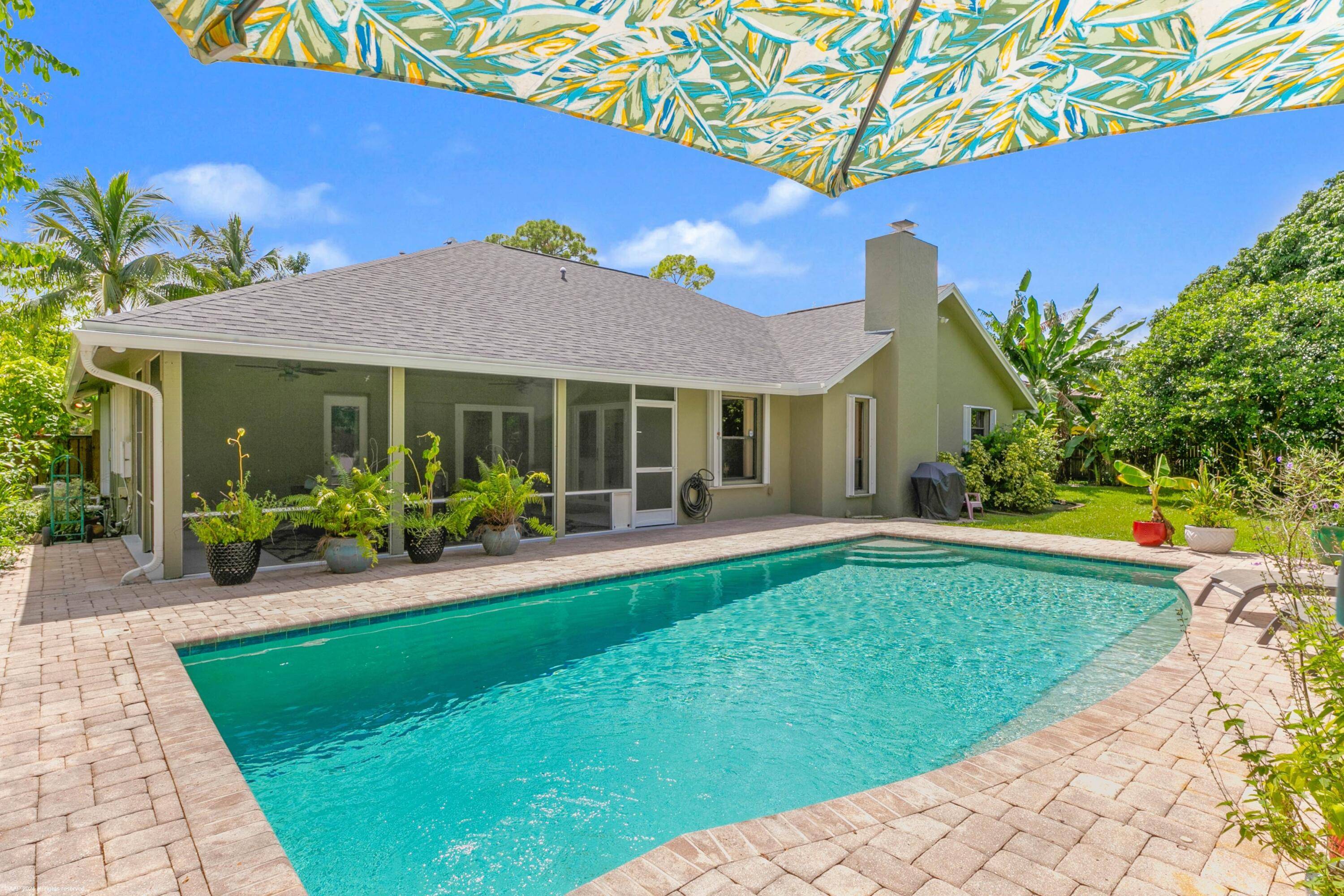 Just under one acre in the gorgeous wooded Wellington neighborhood of Pinewood East 2 !