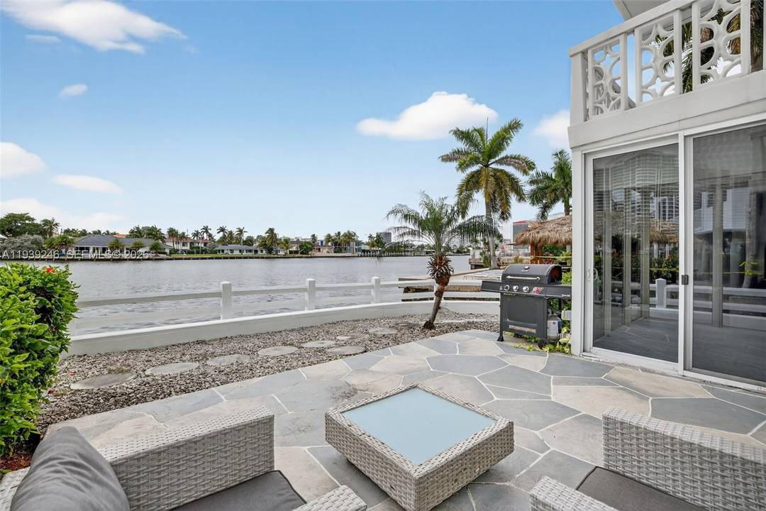 Price Drop ! A rare waterfront gem tucked inside one of Hallandale's most hidden, coveted enclaves on Ocean Drive a one of a kind ground floor corner unit delivers privacy, ...