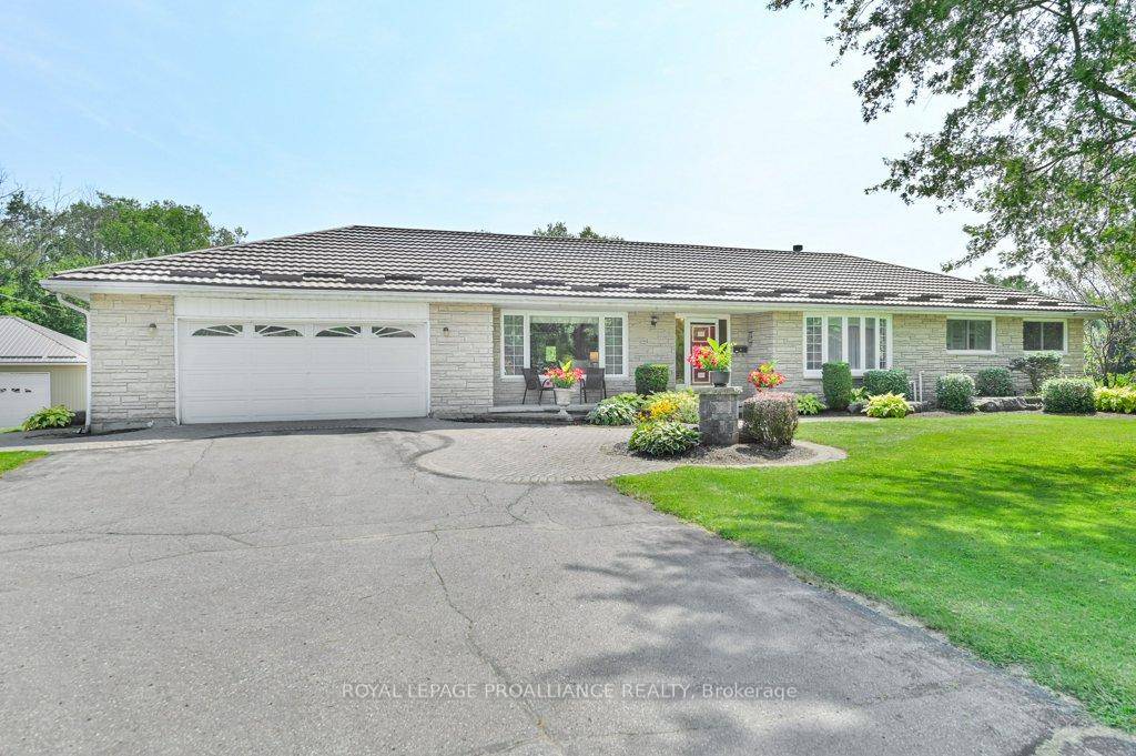 Welcome to 142 Old Madoc Road, a custom bungalow with an attached double car heated garage and a detached 32 x 40 12' high metered separate garage.