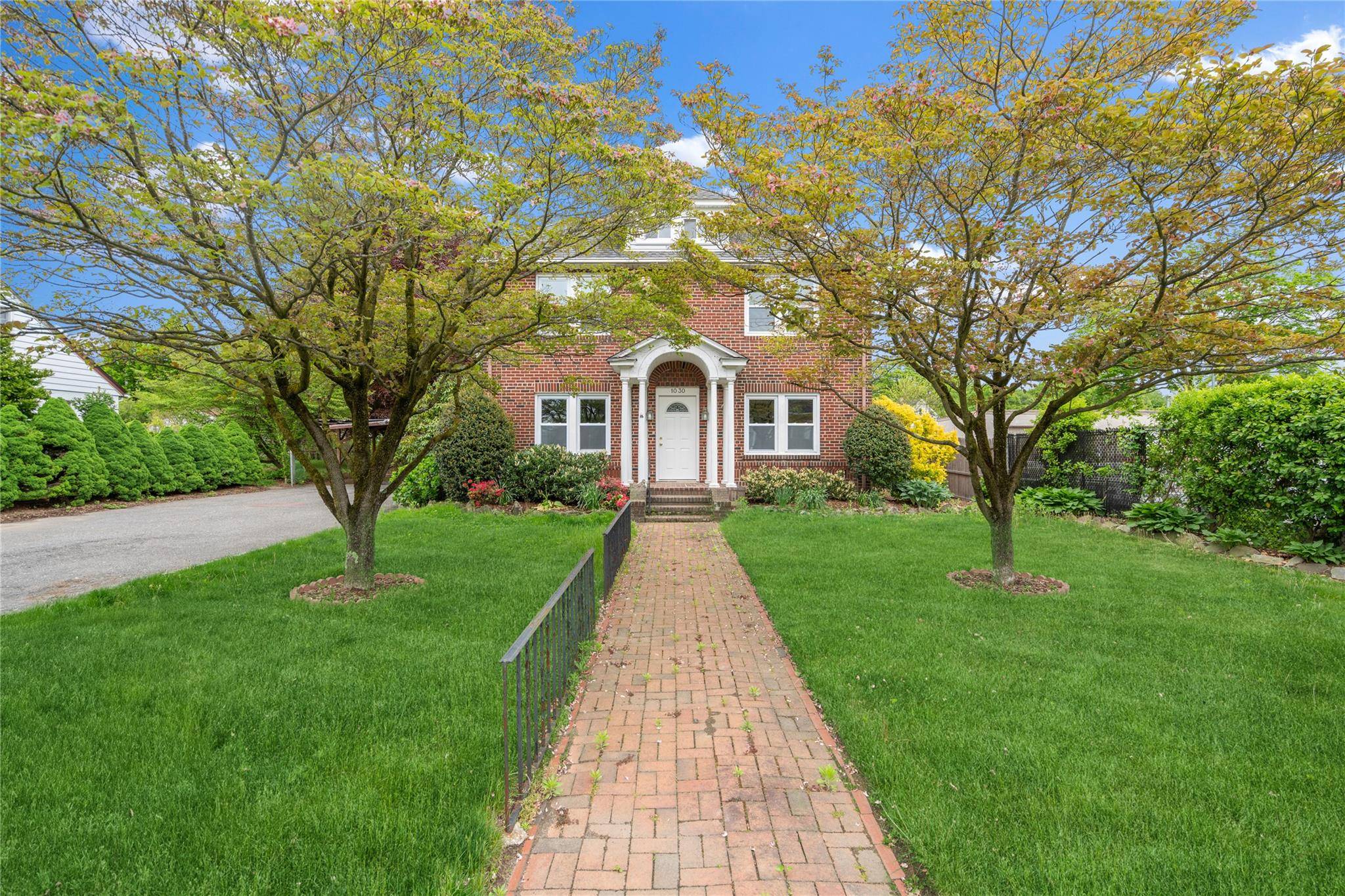 Recently Renovated Charming Brick Colonial offers Large Living Room, Formal Dining Room, Gourmet Eat in kitchen with quartz countertops, white cabinets, panty and SS appliance, Heated Back Porch and Power ...