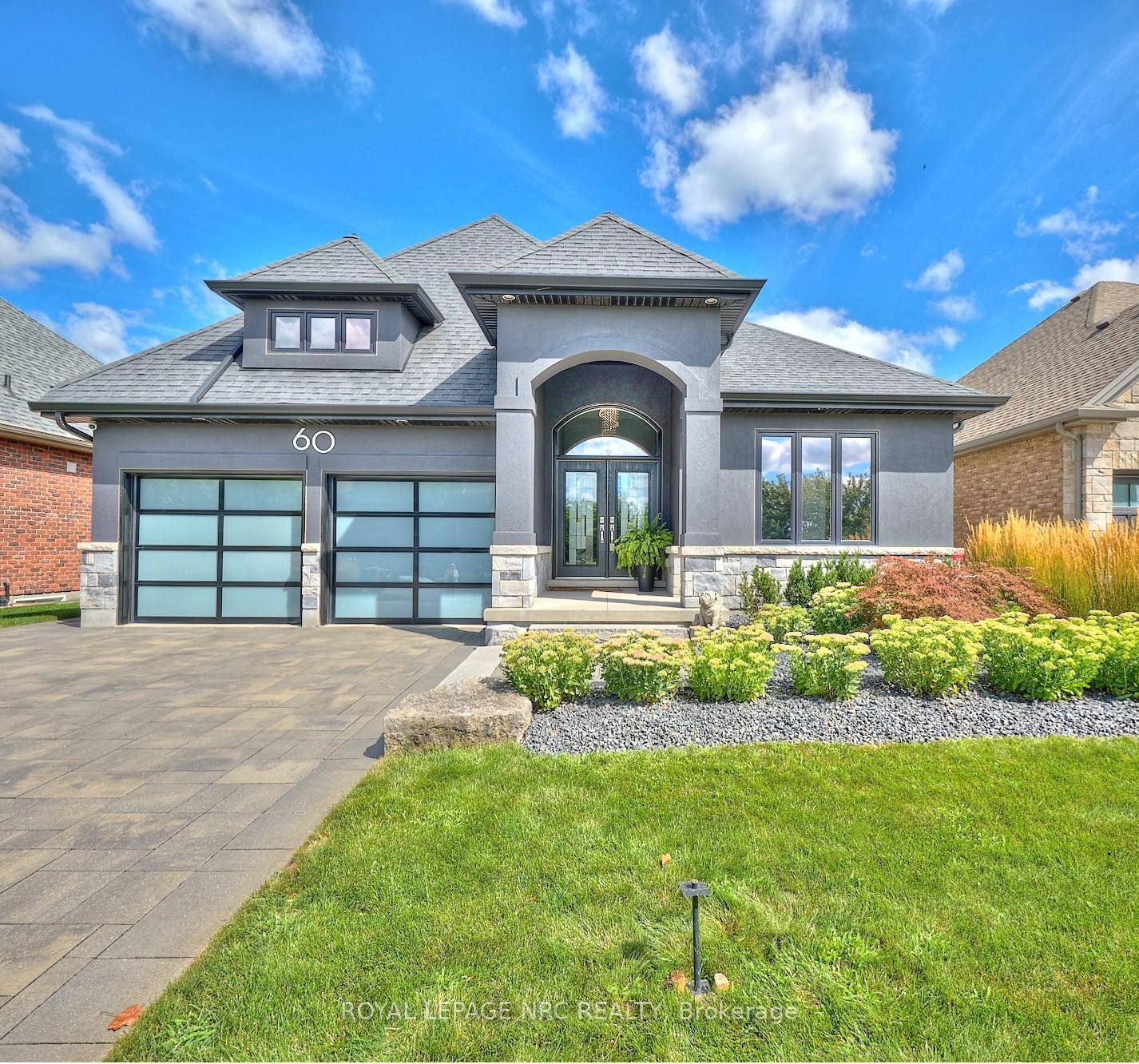OPPORTUNITY KNOCKS ! Rinaldi built former model bungalow aptly named 'The Remington' and perfectly positioned in Fonthill's Rosewood Estates where every home is a masterpiece of architectural design.