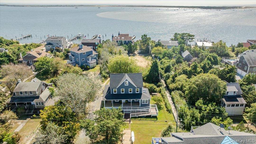 Newly Renovated Turn Key Colonial in Desirable Oak Beach.