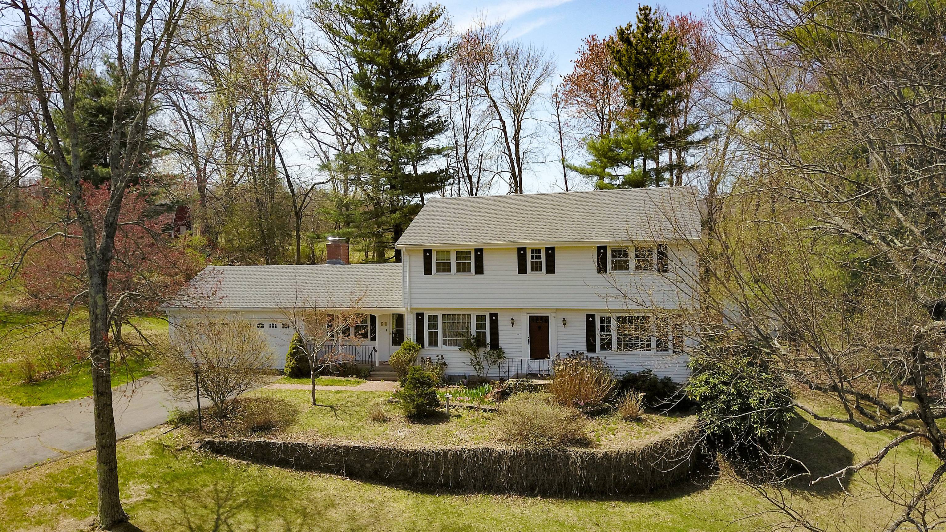 This charming Colonial home is nestled on over 3 4 of an acre, offering breathtaking views of the Traprock Ridge Land Conservatory.