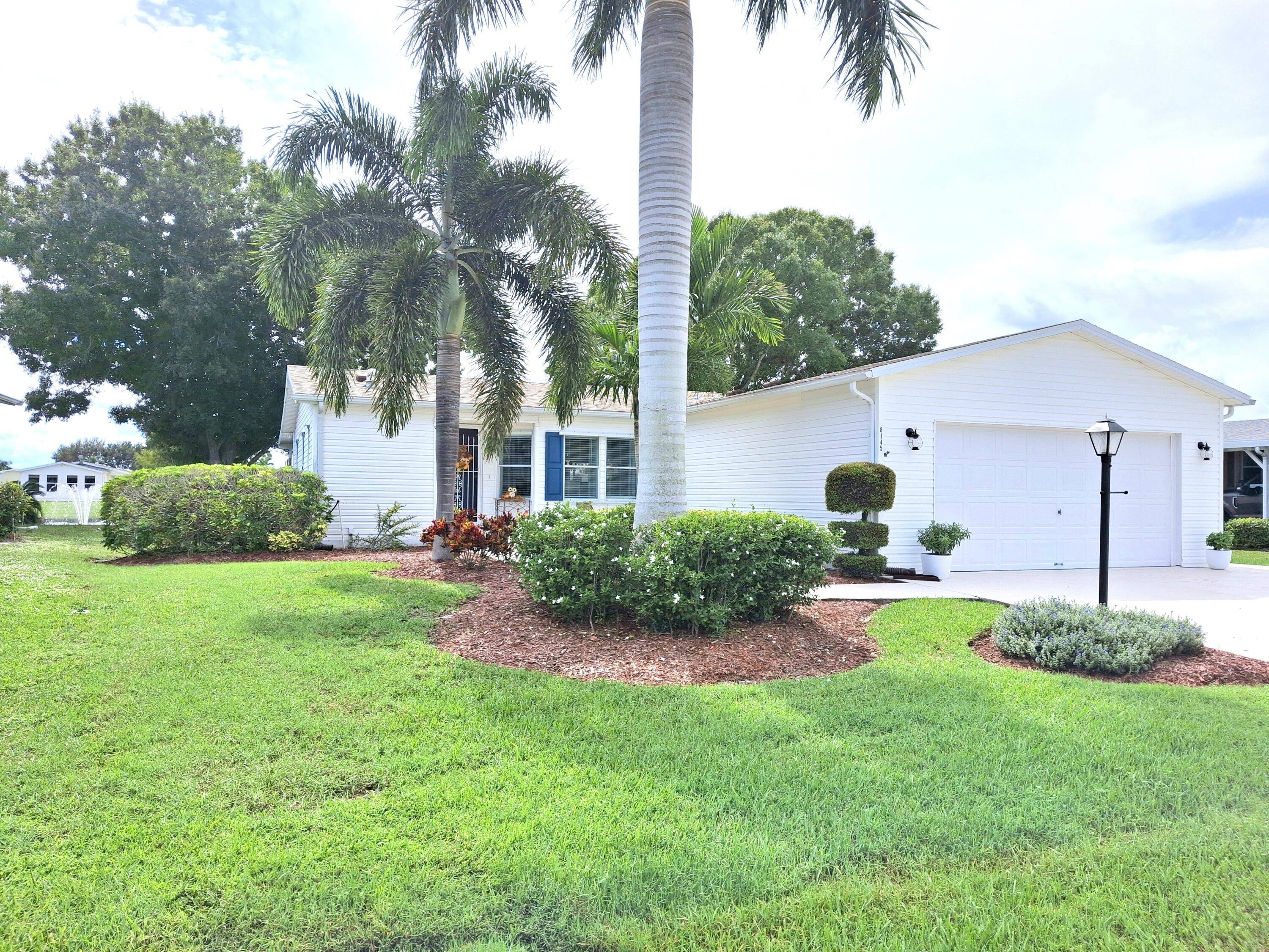 Immaculate water view garage home with two beds two baths.