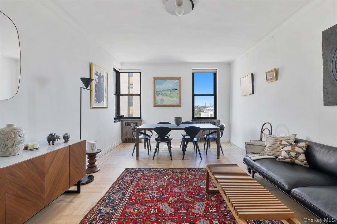 Set atop a distinguished landmarked building in the Concourse Historic District, this top floor corner unit is a pristine three bedroom, two bathroom floor through residence offering exposures to the ...