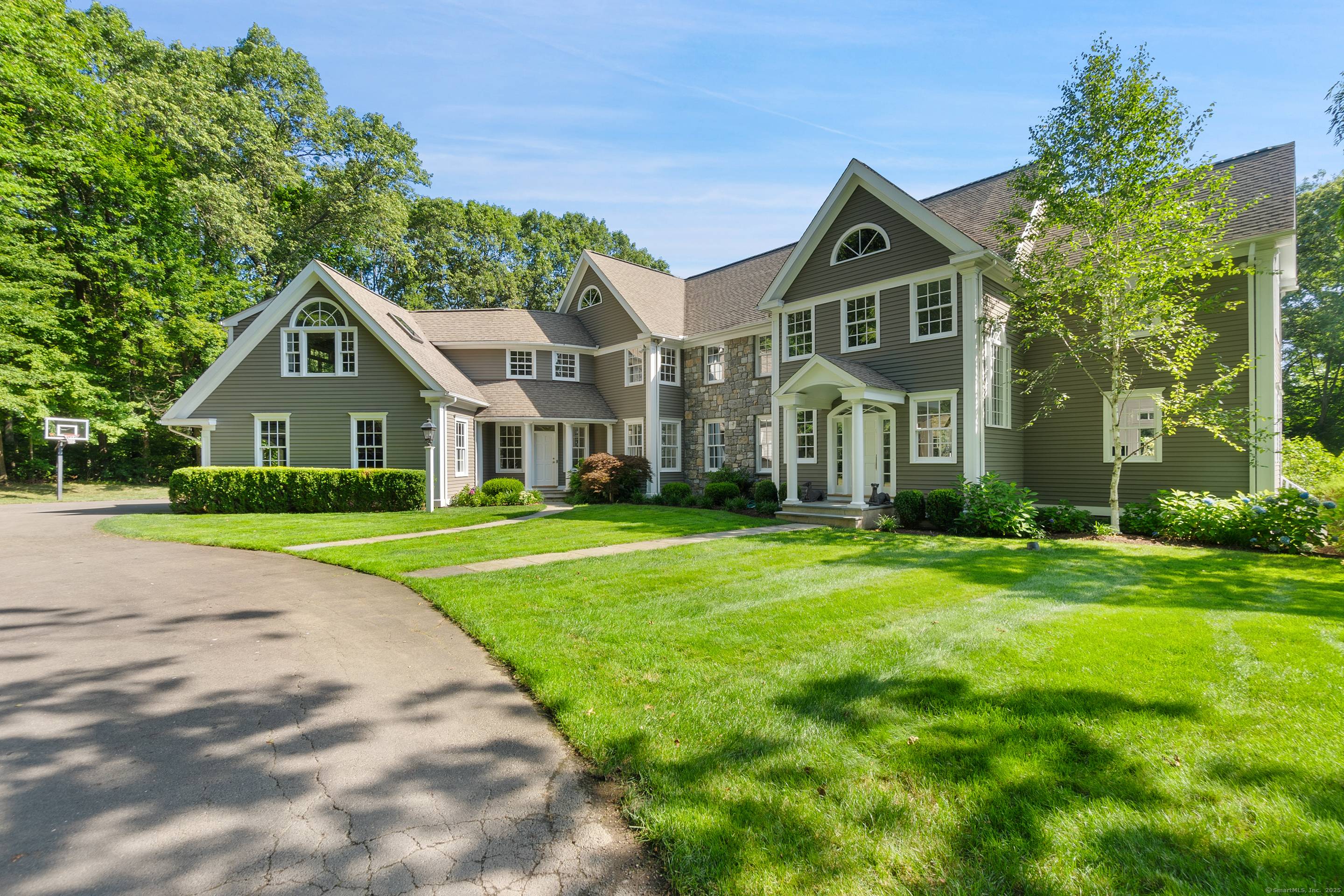 This spectacular residence blends timeless elegance with modern sophistication, having been meticulously updated with the finest finishes throughout.