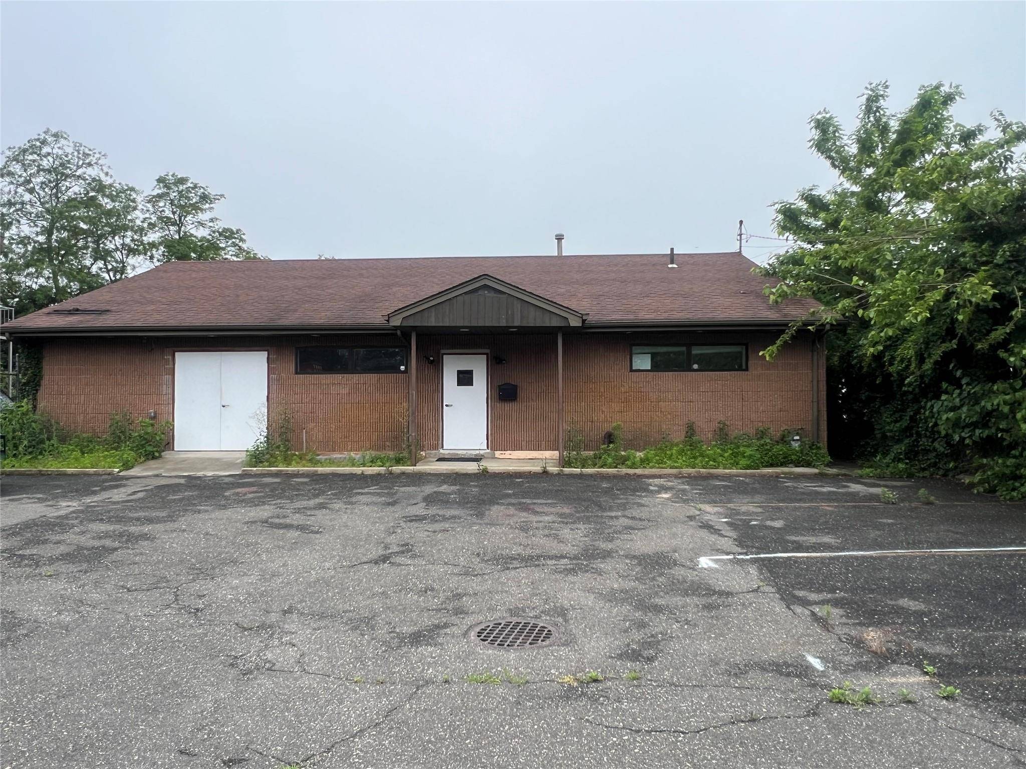 Price Reduction, Free standing office building with 2, 576 SqFt FOR SALE located in the Heart of Massapequa.