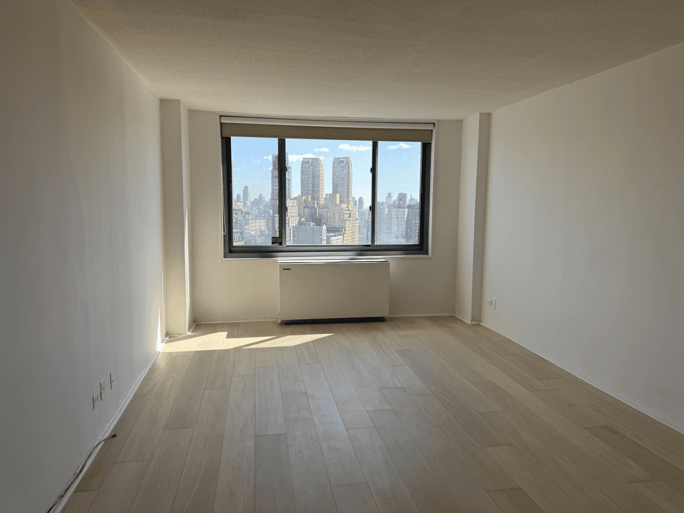 High floor studio with direct views of Central Park.