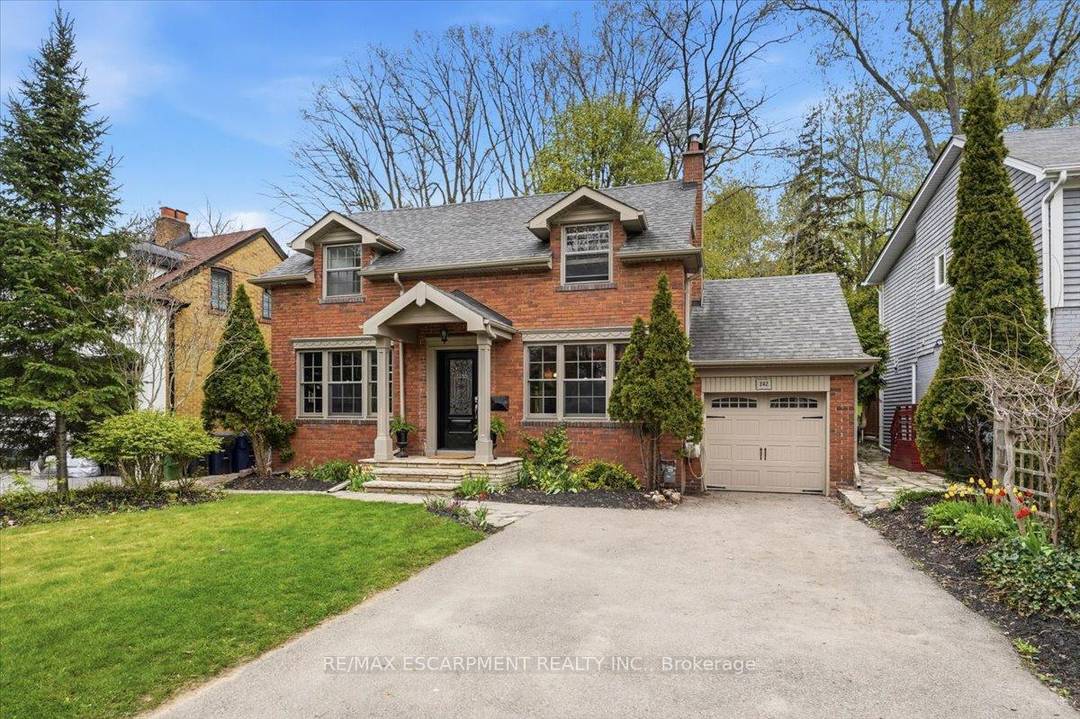 Welcome to 242 The Kingsway, a timeless red brick home in the heart of Etobicoke's prestigious Edenbridge Humber Valley community.