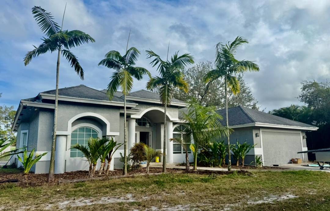 Discover peaceful living at 1462 F Road, Loxahatchee Groves a beautifully updated home on a serene horse farm with a private pool and spacious outdoor areas.