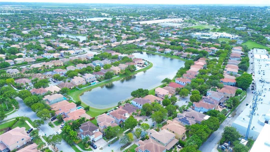 Beautiful lakefront home with direct lake views located in the highly sought after Cantamar community in Cutler Bay.