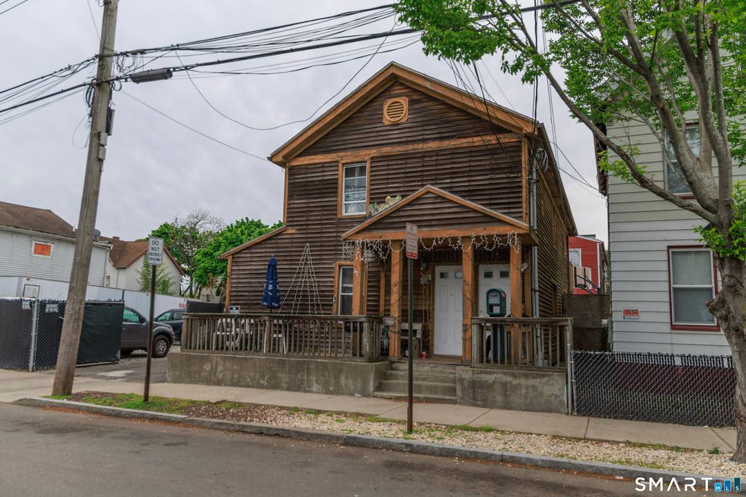 Three connected properties sold as a package 82 Fillmore St, 76 Fillmore St, and 86 Fillmore St.
