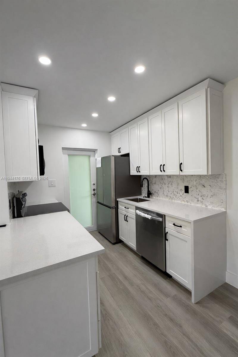 Newly renovated 1 bedroom residence filled with natural light in a secure, gated building, ideally located in the highly desirable South of Fifth neighborhood.