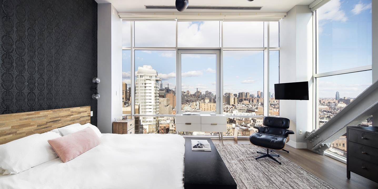 Dramatic and chic full floor condominium is now available for rent on the red hot Bowery.