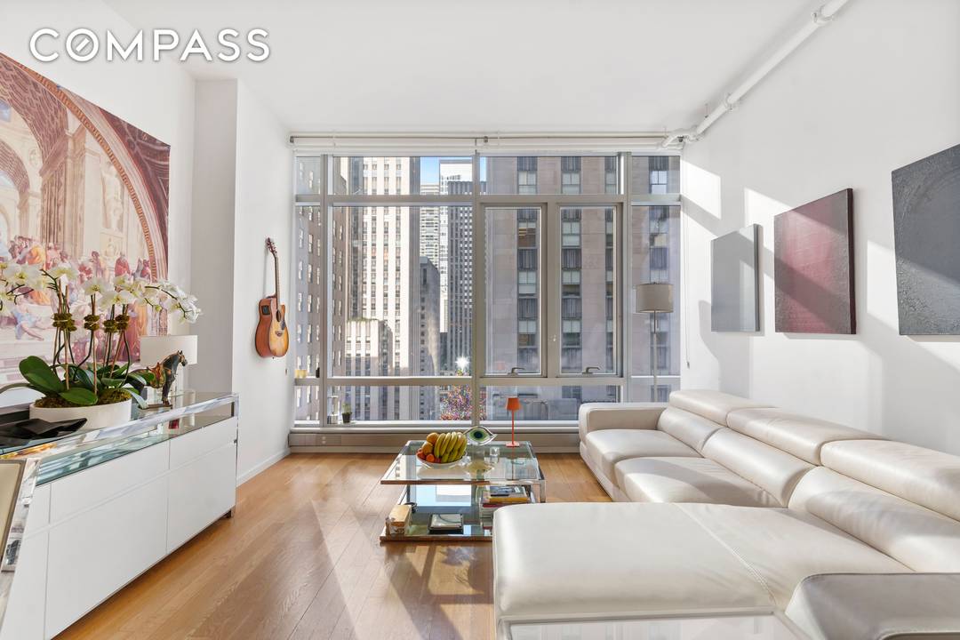 Condo Doorman Washer dryer in unit Investor friendly building Direct views of Rockefeller Plaza Direct iconic views of Rockefeller Plaza from one of the largest one bedroom lines at The ...