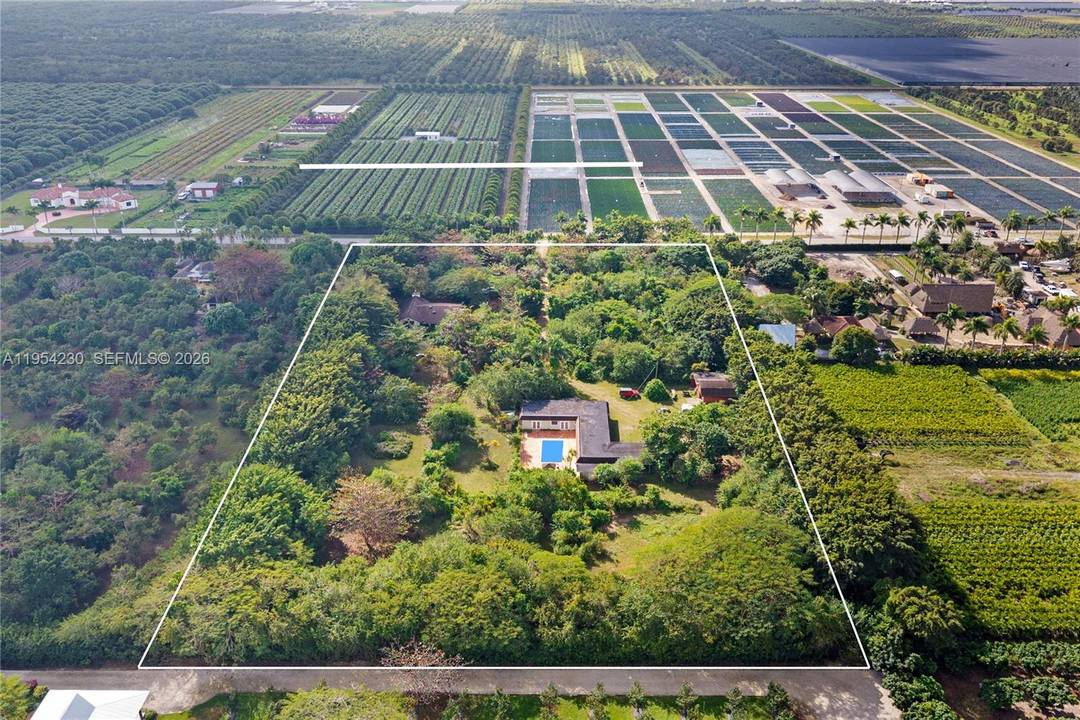 Welcome to 20975 SW 264th Street, a rare income producing estate set on nearly 5 acres of agriculturally zoned land in Homestead, just 50 minutes south of Miami.