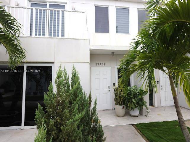 Beautiful 4BD 3. 5BA with porcelain tiles, impact windows doors, and an open modern kitchen with wood cabinets, granite counters, backsplash, and stainless appliances.