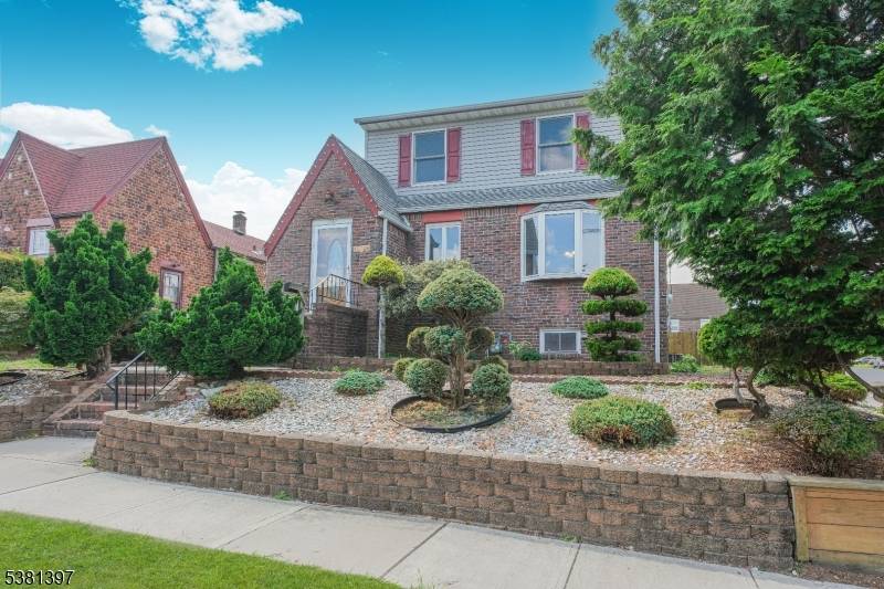 Lovely well maintained Cape on corner lot.