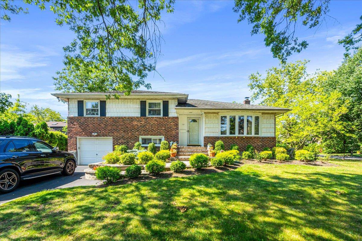 Welcome to this well maintained 3 bedroom, 2 bath split level home in the highly sought after Herricks School District !