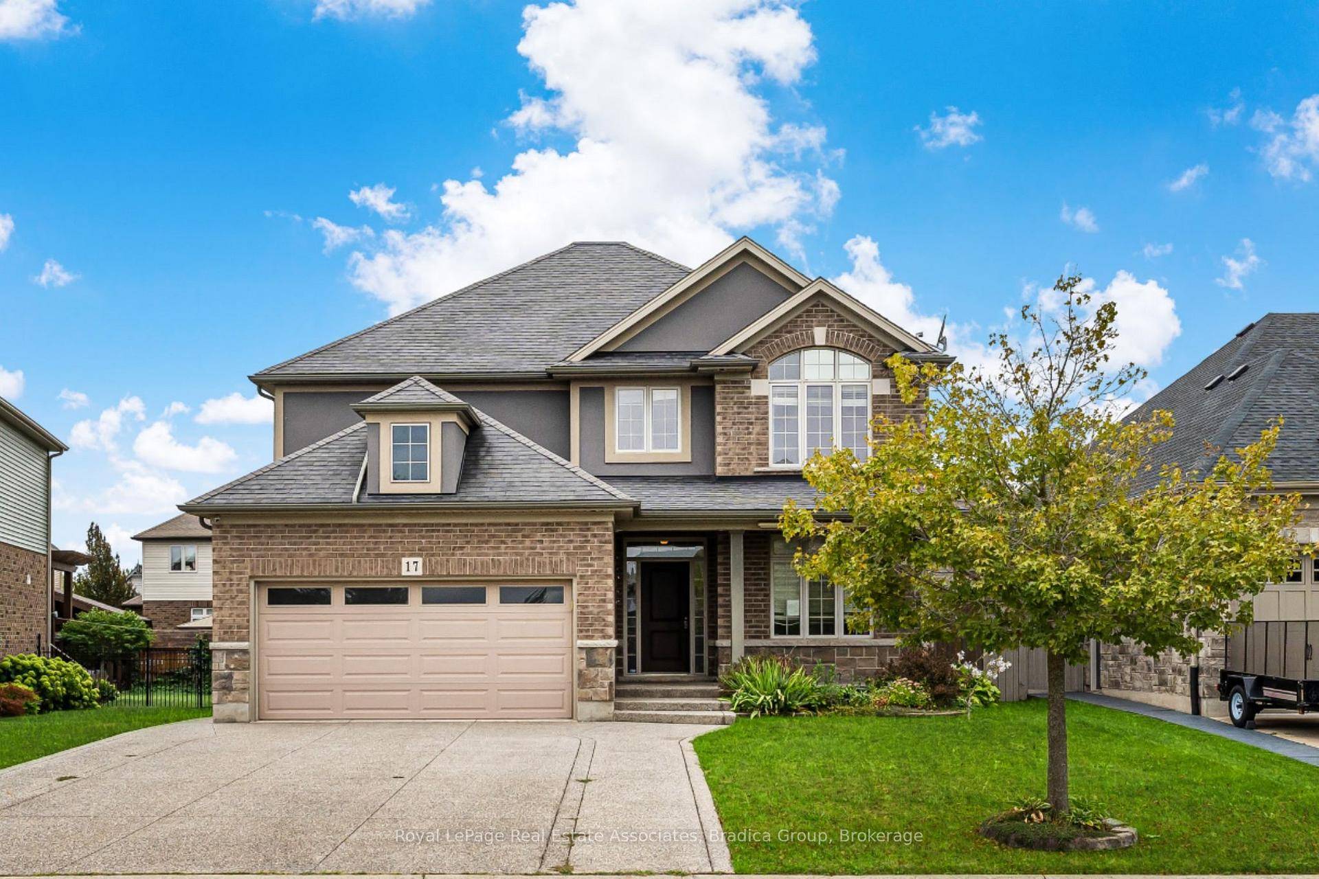 17 Trailwood Drive, built by Rinaldi Homes in the prestigious Coyle Creek neighbourhood, blends timeless design with modern convenience.