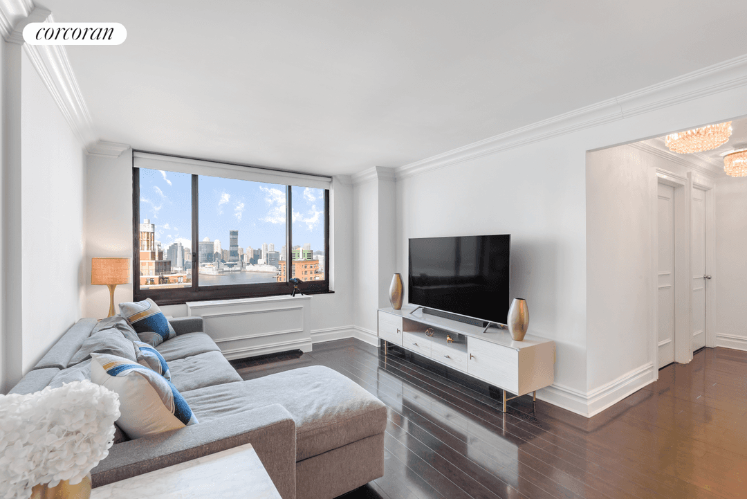 Set high on the 32nd floor of Liberty Court, this three bedroom, two bathroom residence offers sweeping, unobstructed views and a thoughtfully updated interior.