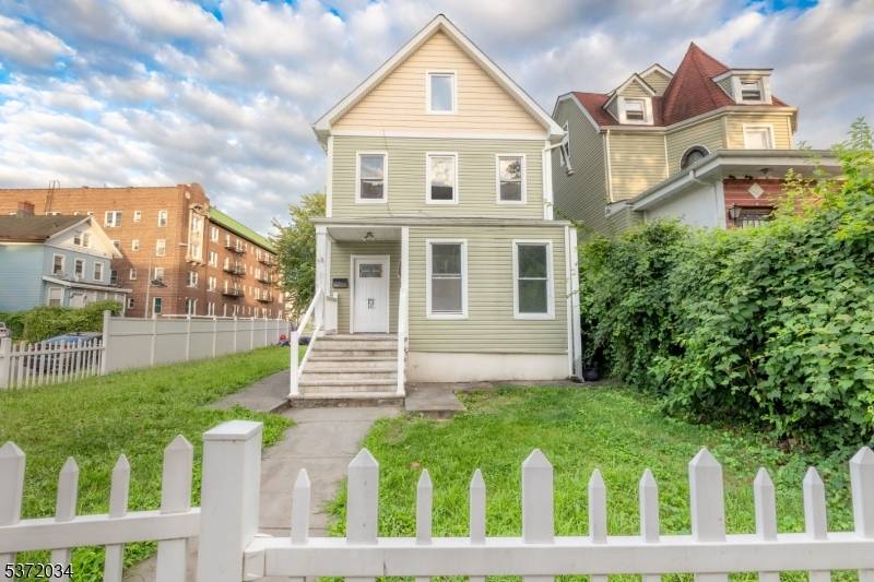 Welcome to 98 Amherst Street, a beautifully maintained Colonial style home featuring 4 spacious bedrooms and 2.