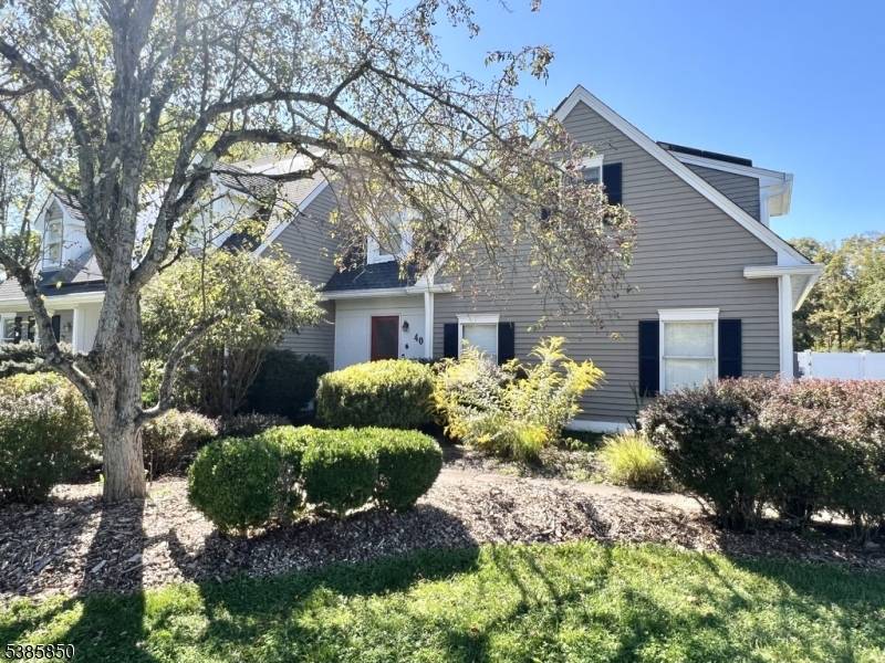 Welcome to this beautifully maintained custom Cape Cod home, featuring 4 spacious bedrooms, 3 full bathrooms, and a 3 car garage.