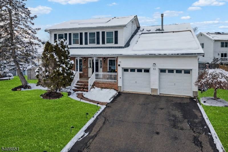 Welcome home to 62 Longfield Drive a beautifully updated 4 bedroom, 2.