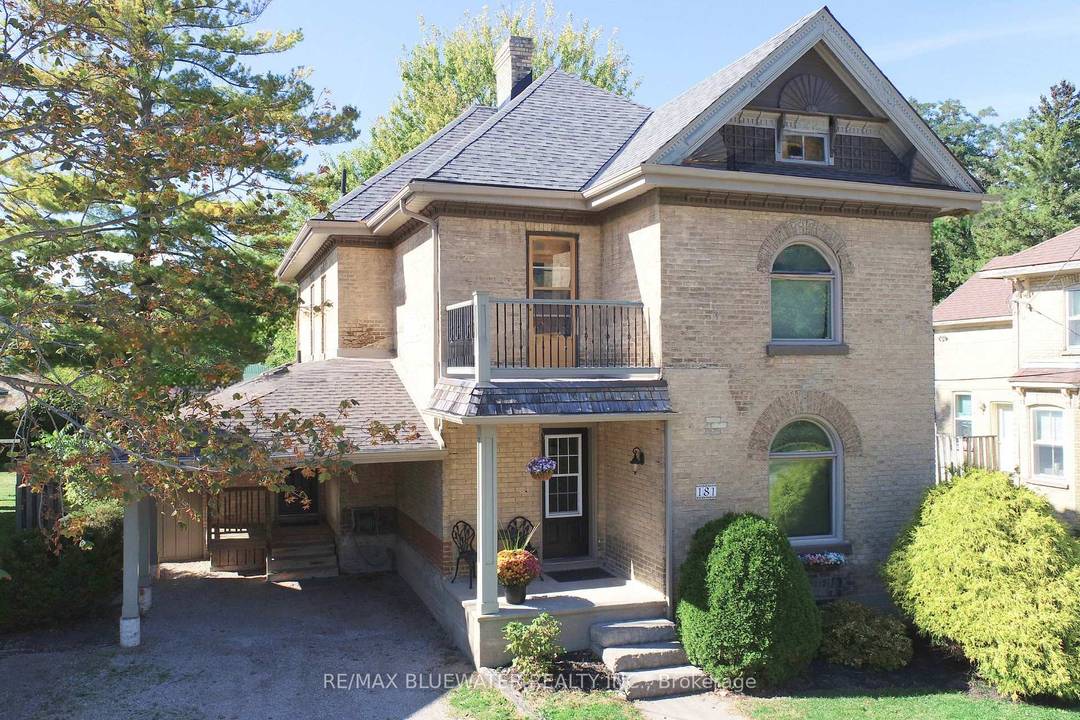 NICELY APPOINTED YELLOW BRICK CENTURY HOME OFFERING LOTS OF CHARACTER IN THE 2, 221 SQ FT OF LIVING SPACE !