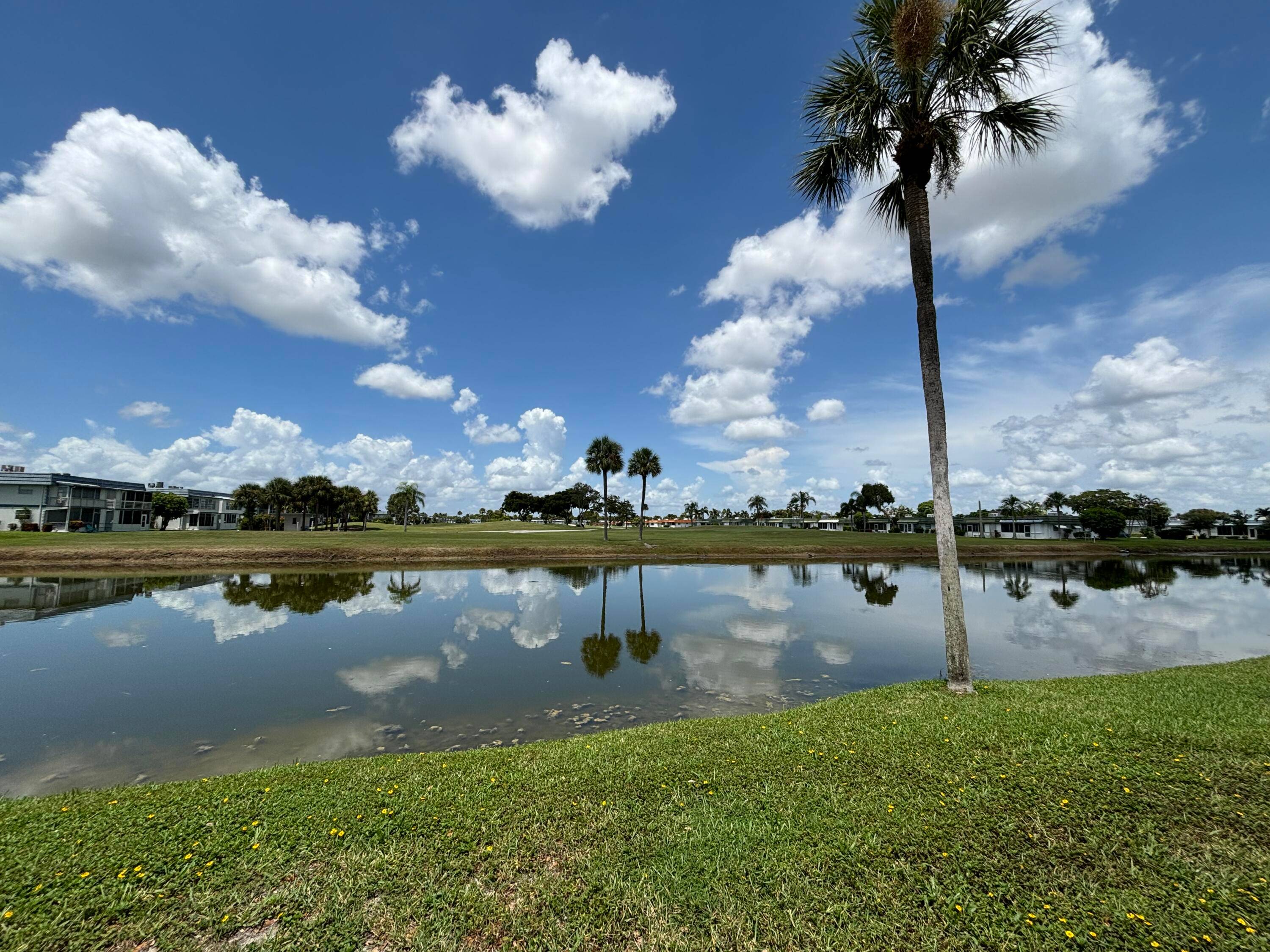 WOW ! Beautiful lake golf views from the rear of this totally upgraded unit w kitchen w stainless steel appliances.