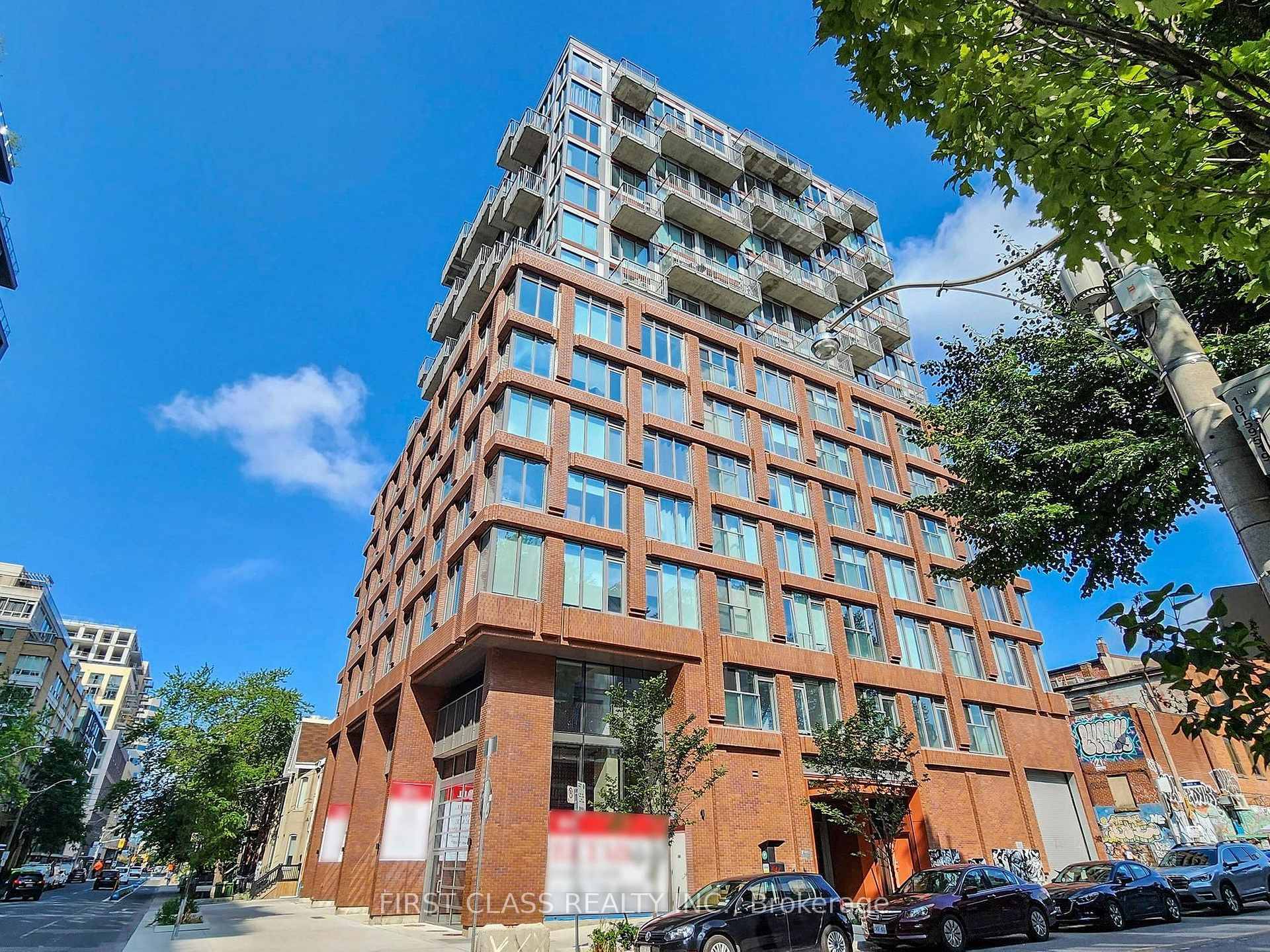 Built in 2023, This Newer Stunning 2 1 Bedroom Corner Suite with Breathtaking CN Tower Views at Rush Condos, nestled in Toronto's vibrant Queen West neighborhood.
