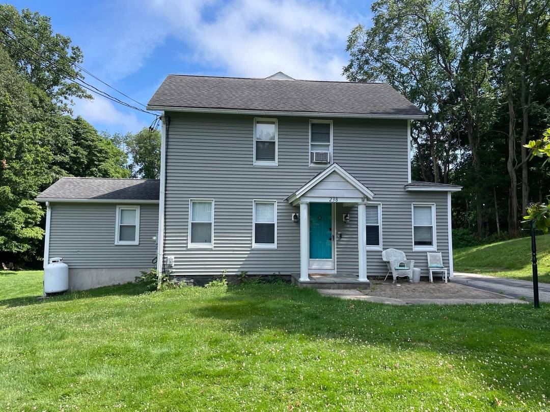 Welcome to this Charming Colonial style home on corner lot with 1.