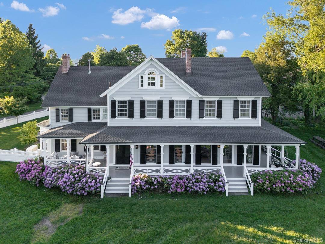 Longhouse Farm is a breathtakingly restored farmhouse that seamlessly blends historic elegance with luxurious modern upgrades.
