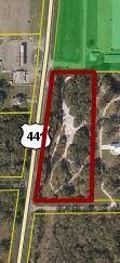 COUNTRY HILLS VACANT LAND Buildable homestead.