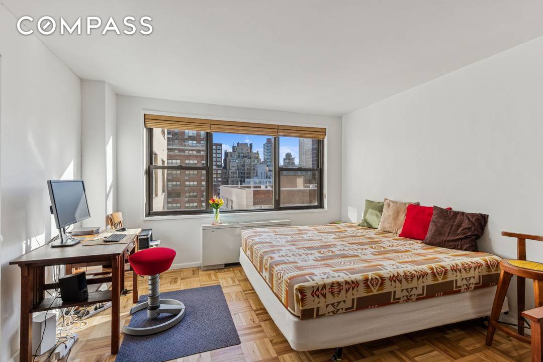 LOCATION and VALUE move in ready studio in full service building !