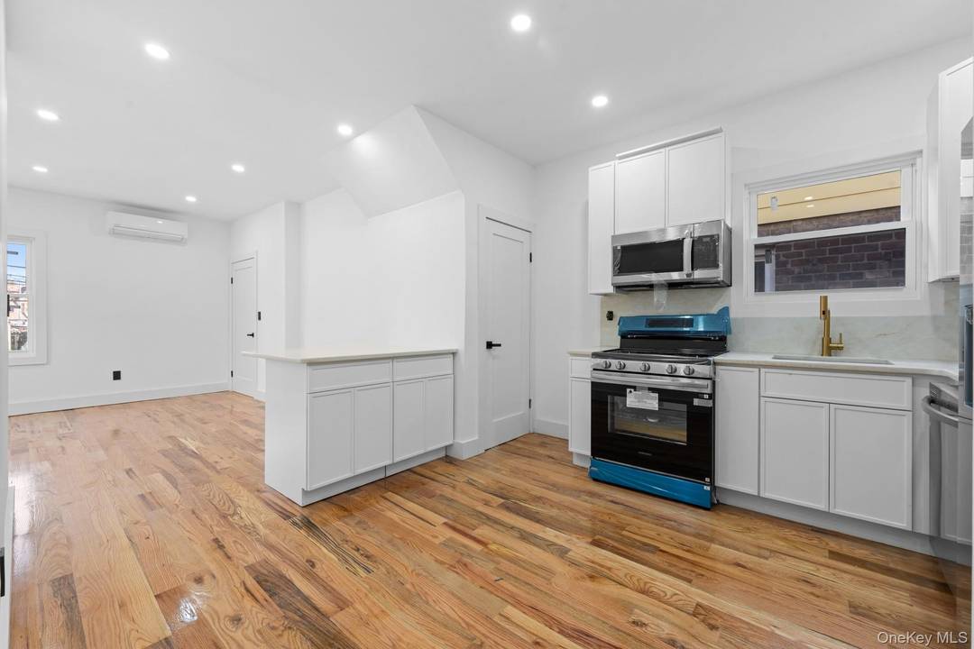 Welcome to 179 11 120th Ave a fully remodeled, no expense spared brick beauty !