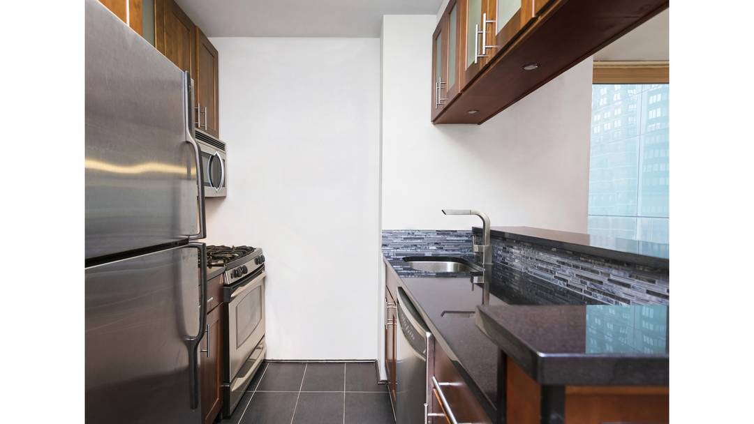 Turn Key Renovated 1 Bed Convertible 2 Bedroom in Doorman Condo with Pool Open Houses are By Appointment Only.