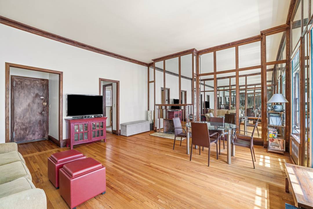 Charming top floor studio in an elevator townhouse on a prime Upper East Side block.