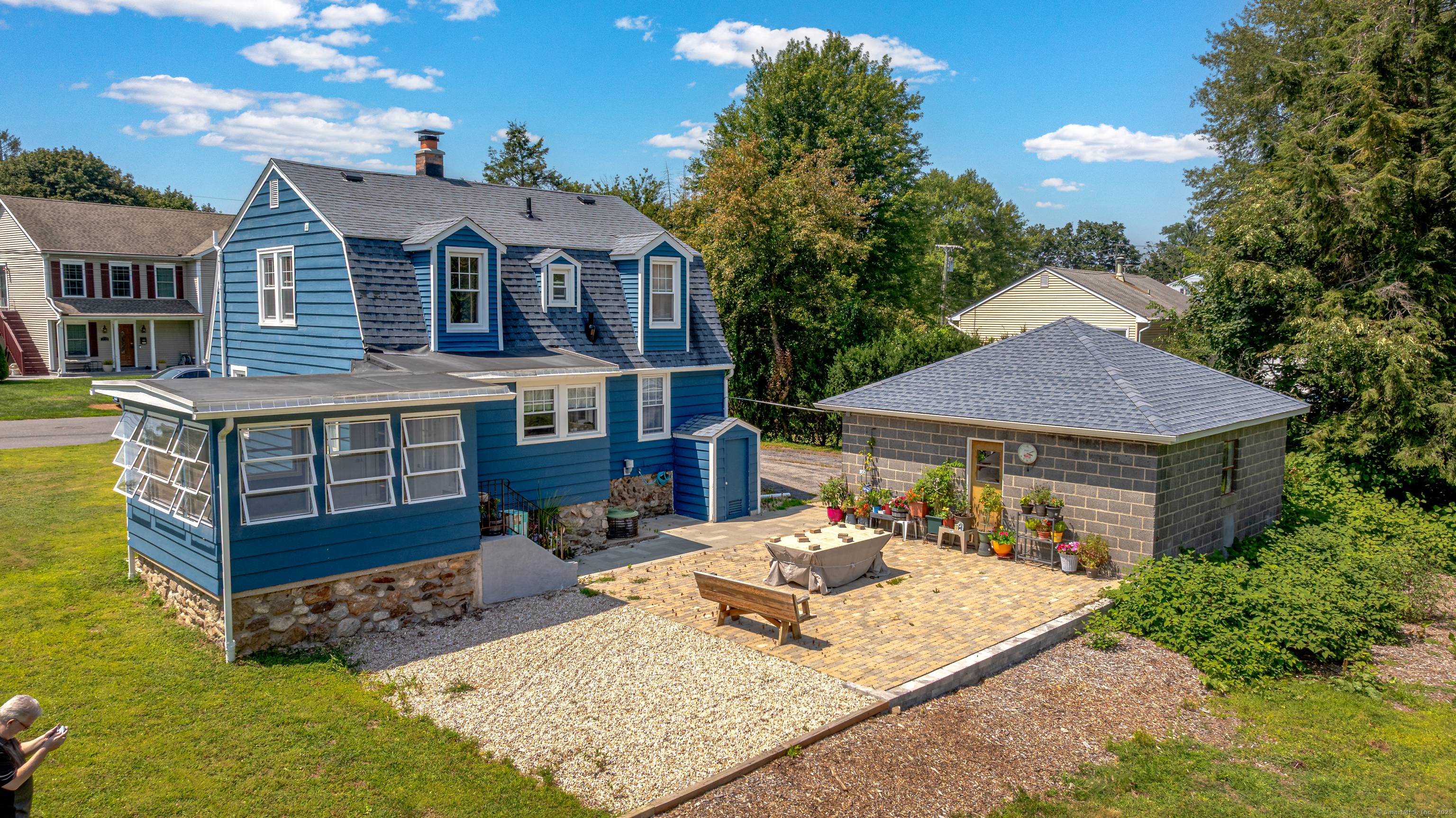 Charming remodeled 4 Bedroom Colonial with beautiful brand new kitchen with Quartz Countertops, soft close dovetail modern cabinetry, Center Island with Breakfast Bar and Stainless Steel Appliances.