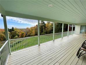 Tastefully and thoughtfully renovated country hideaway with gorgeous distant views of Woodbury and the Litchfield County Hills.
