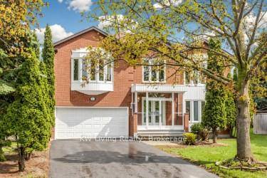Client Experience refined living in this majestic 5 bdrm residence featuring a stylish glass enclosed front porch and a thoughtfully designed layout.